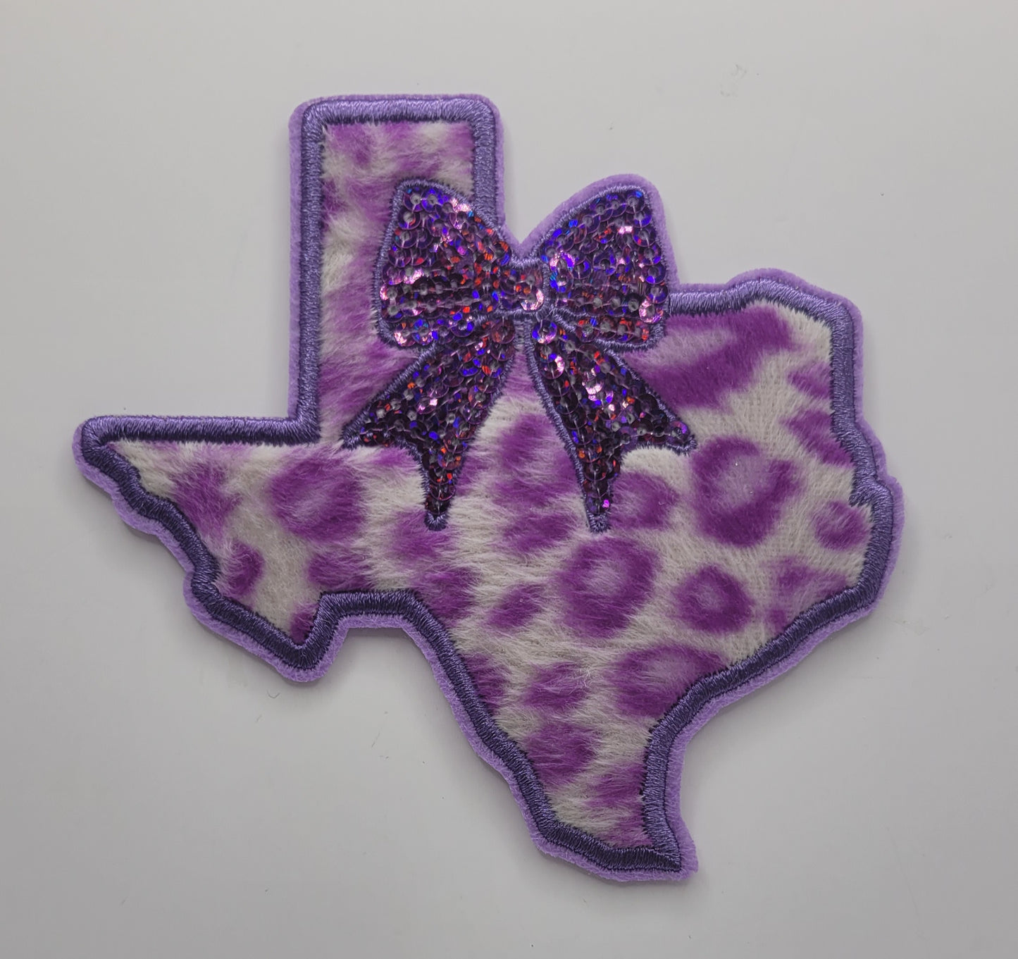 Leopard Texas W/ Sequin Bow Iron-On PATCH *DISCONTINUED* - Texas Transfers and Designs