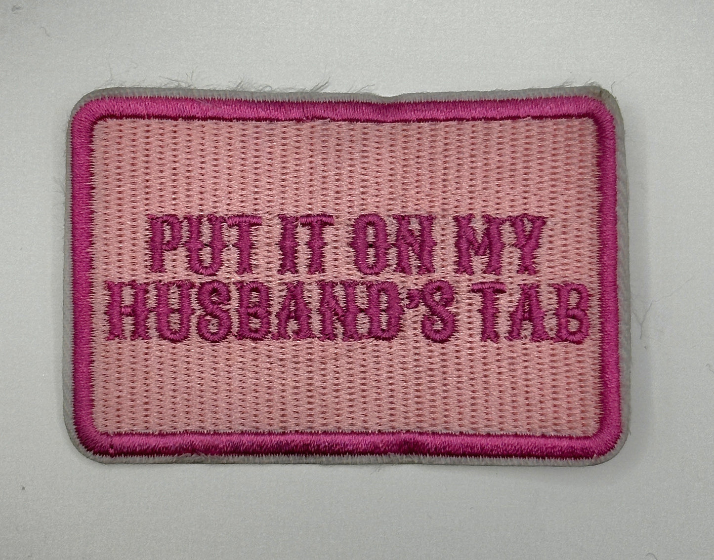 Put It On My Husbands Tab(Pink) Iron-On Patch - Texas Transfers and Designs