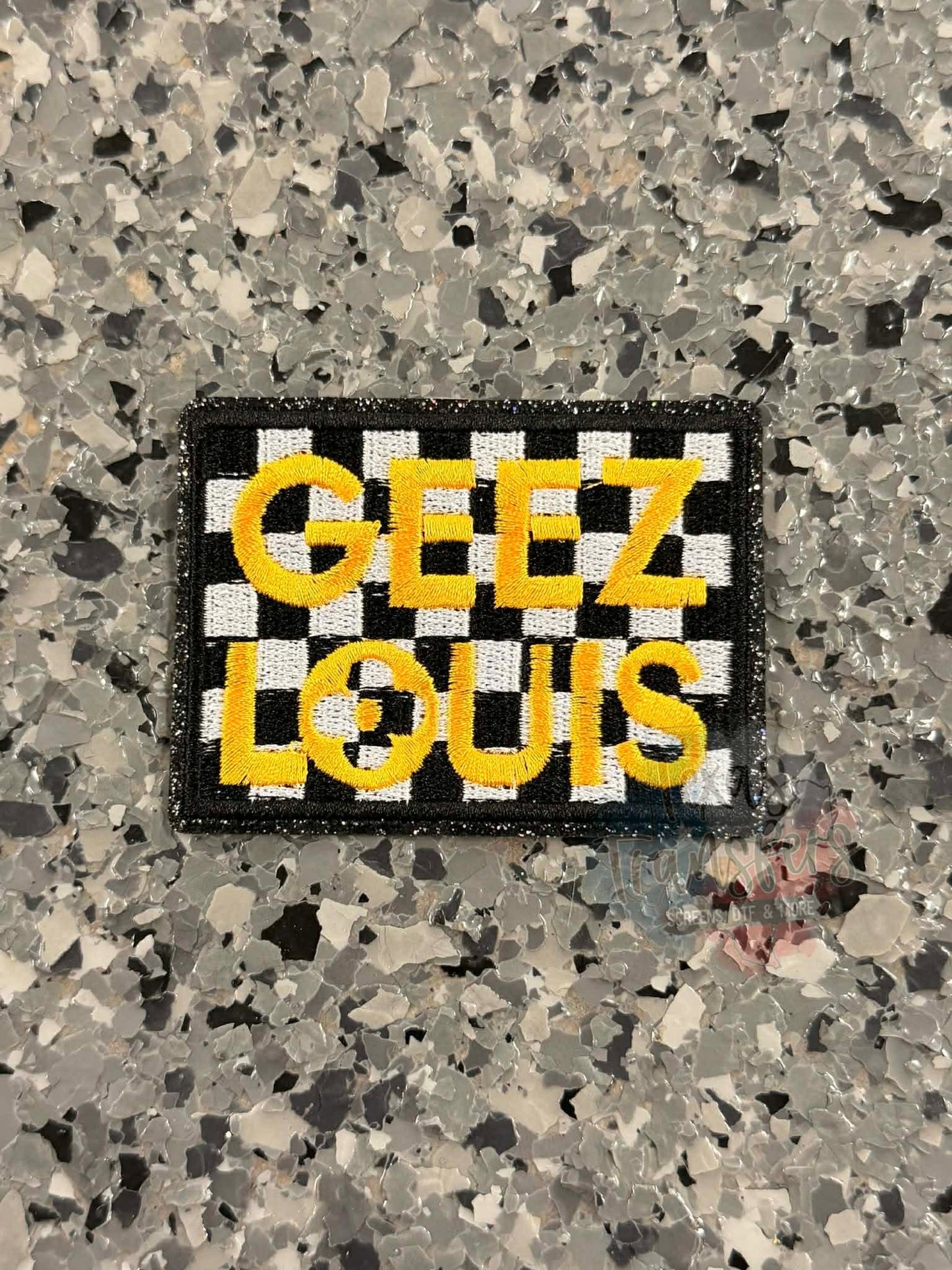 Geez Louis Checkered Iron-On Patch - Texas Transfers and Designs