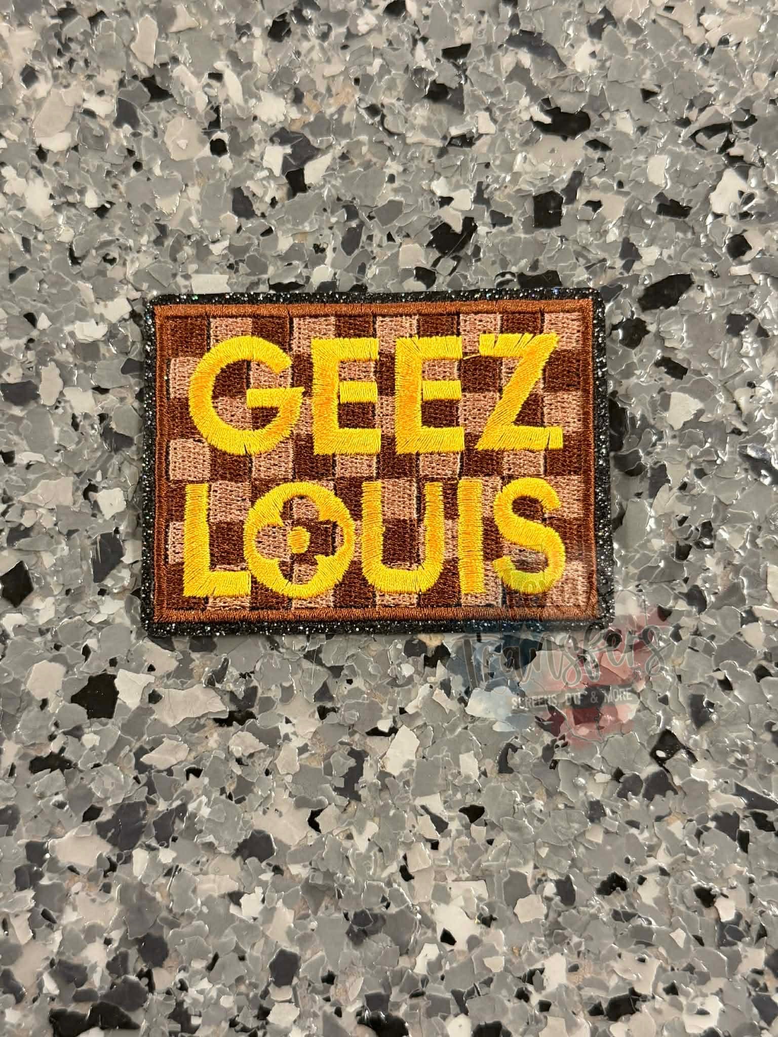 Geez Louis Checkered Iron-On Patch - Texas Transfers and Designs