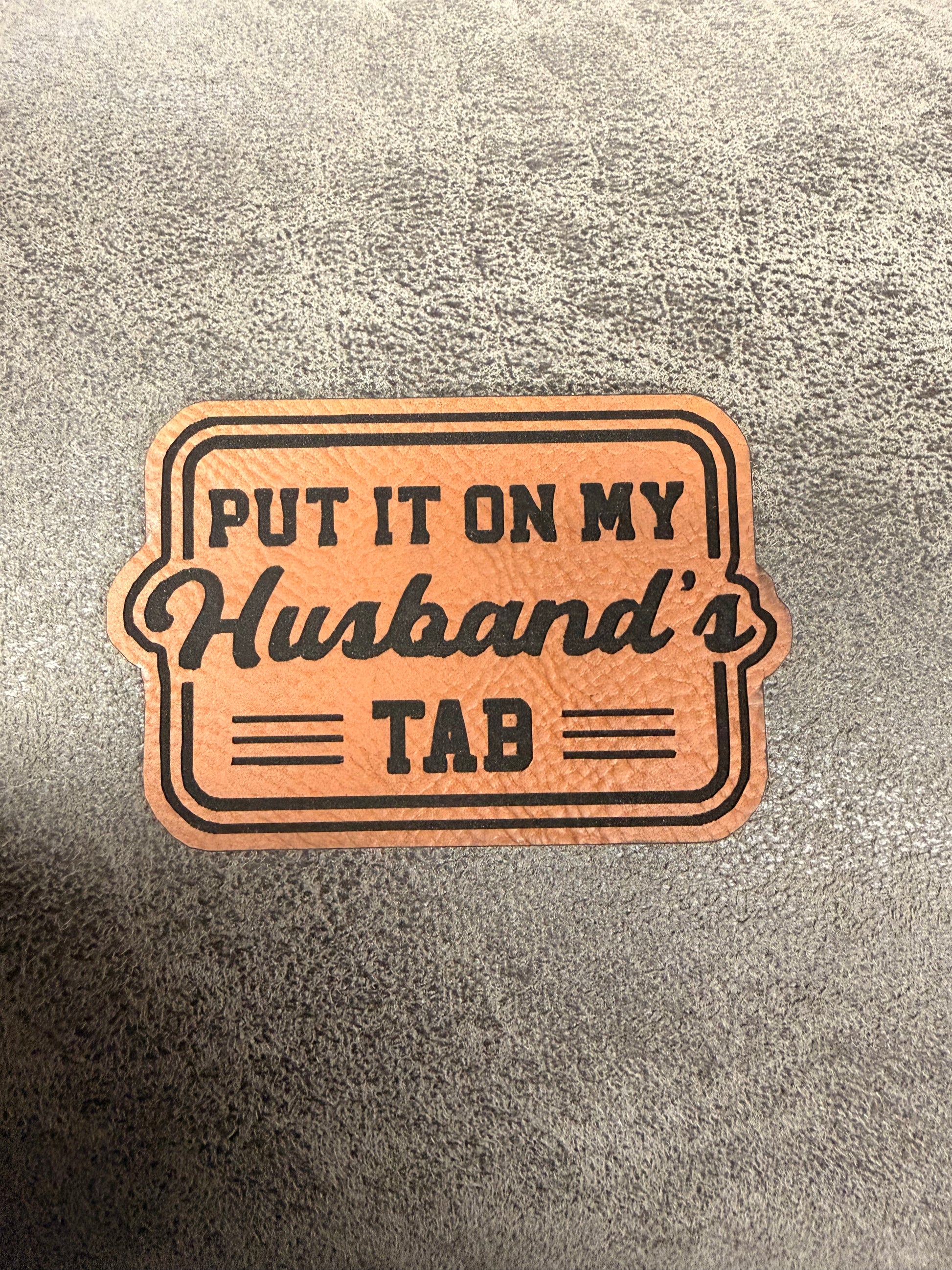 Put it on My Husband’s Tab Leatherette Iron-On Patch - Texas Transfers and Designs